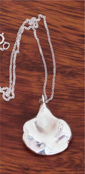 Oyster mushroom pendant in silver back view by Michelle Davis