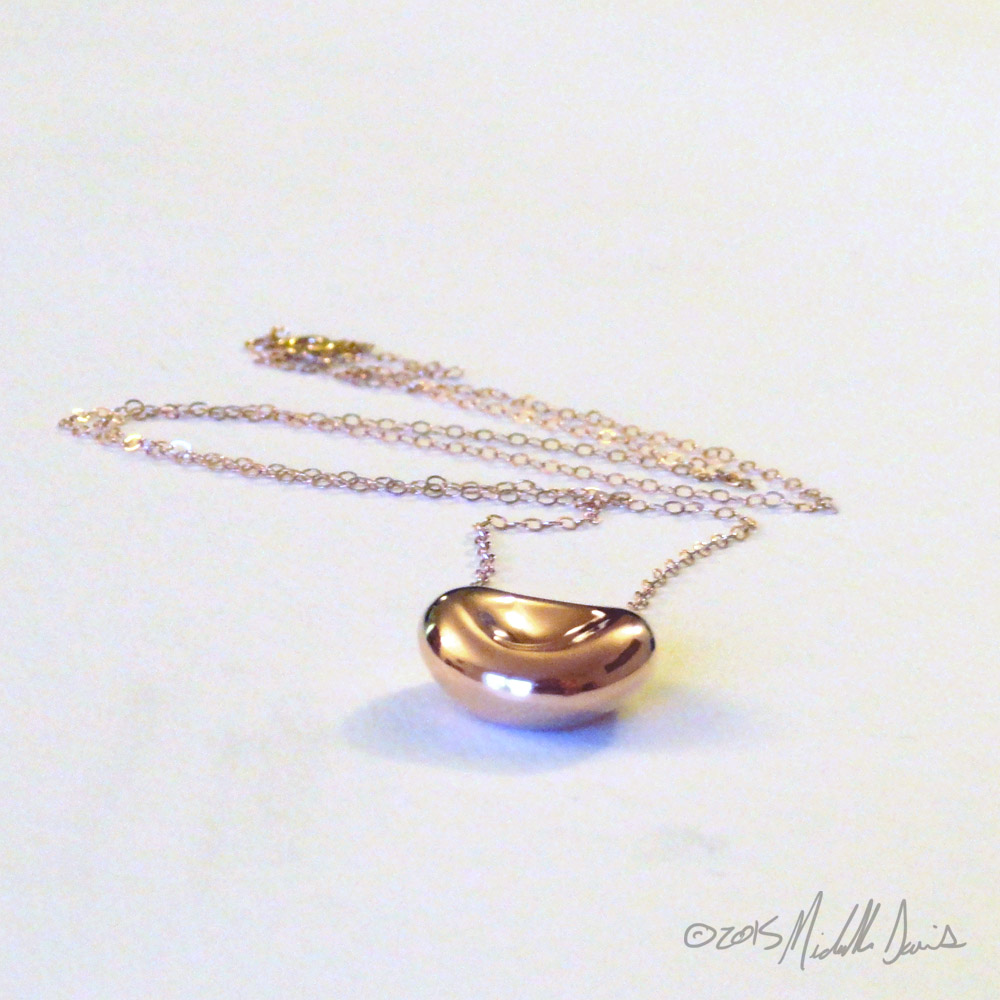 rose gold plated red blood cell pendant designed by Michelle Davis